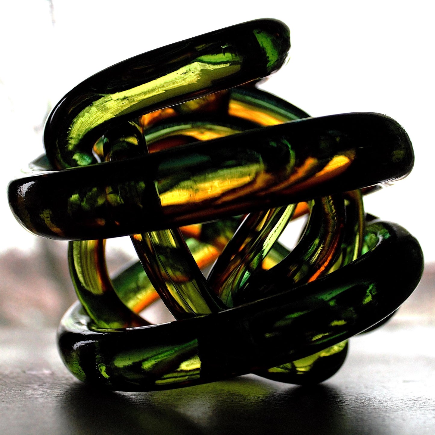 Multicolor Twisted Glass Knot: Intertwining Art Glass Sculpture