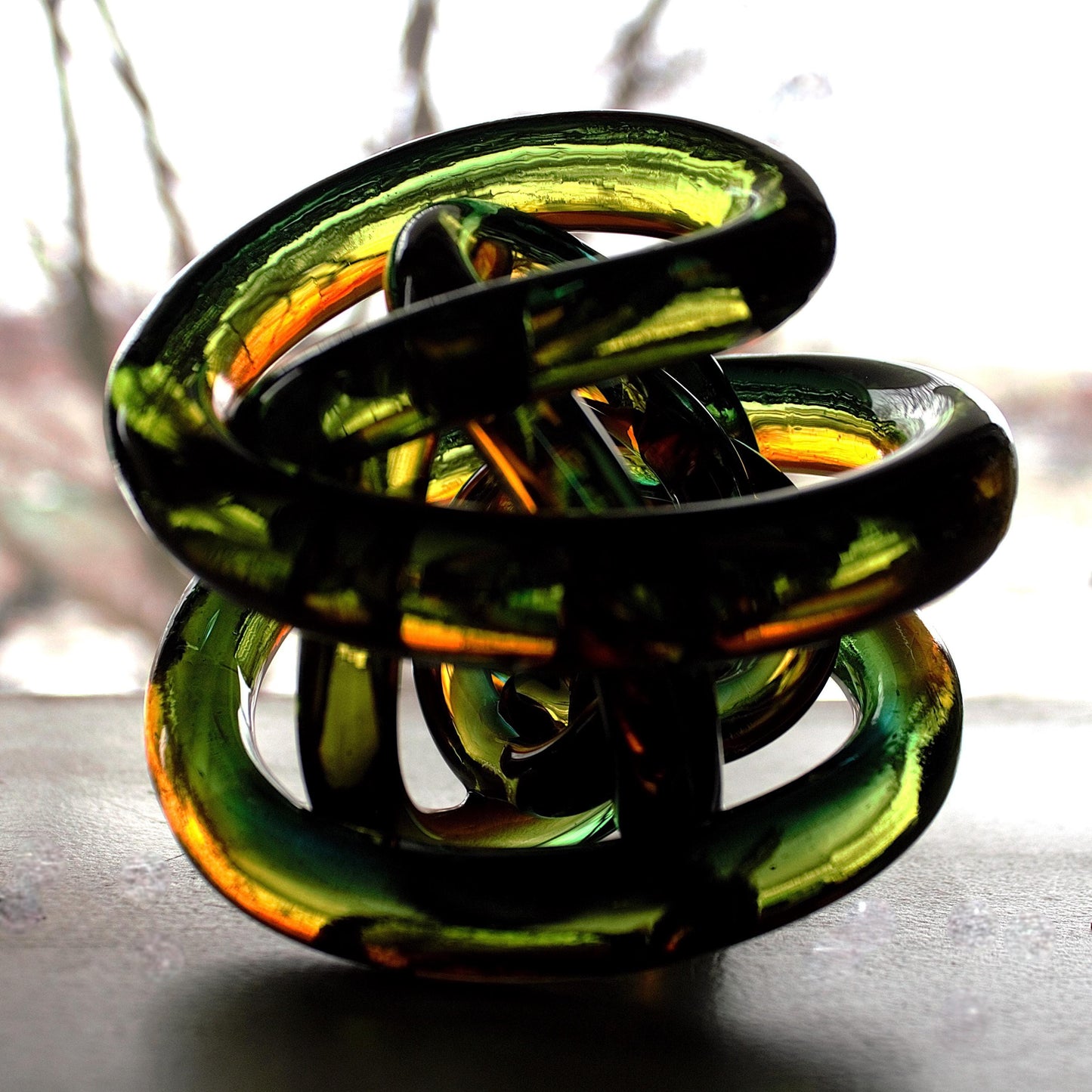 Multicolor Twisted Glass Knot: Intertwining Art Glass Sculpture