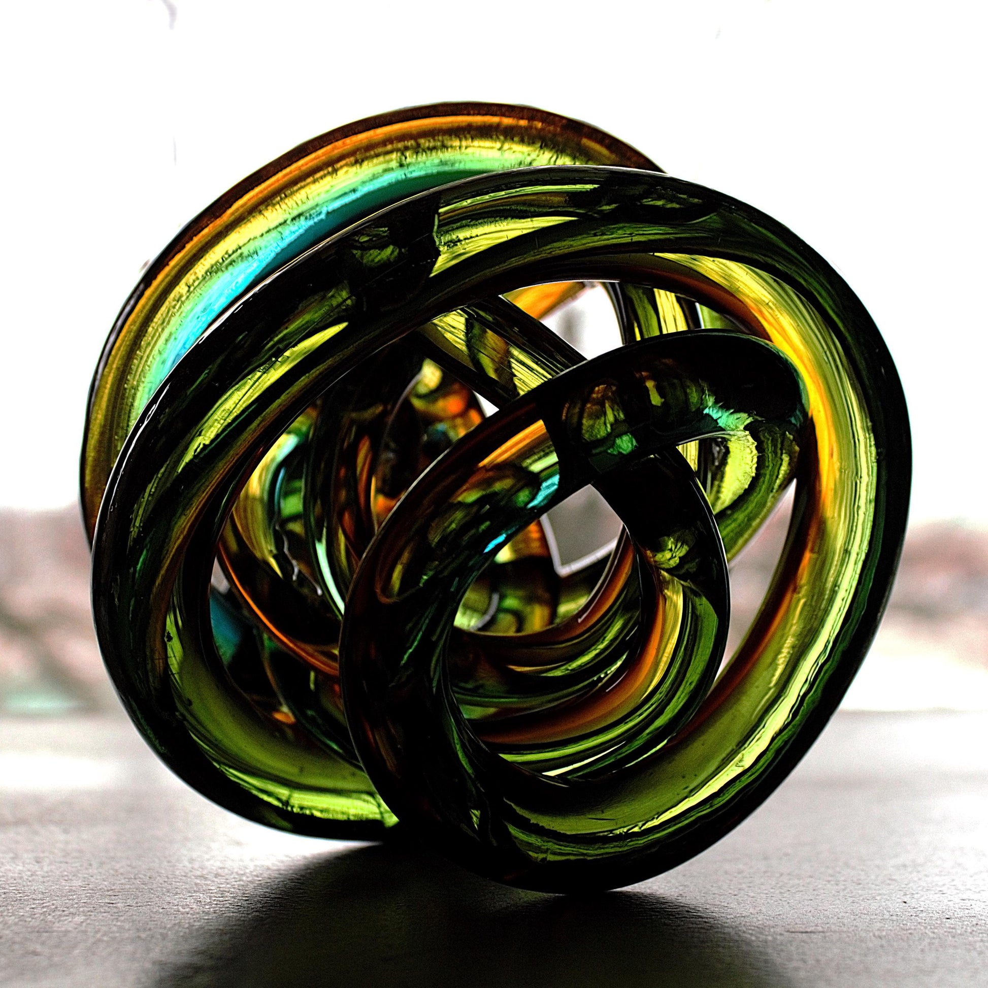 Multicolor Twisted Glass Knot: Intertwining Art Glass Sculpture