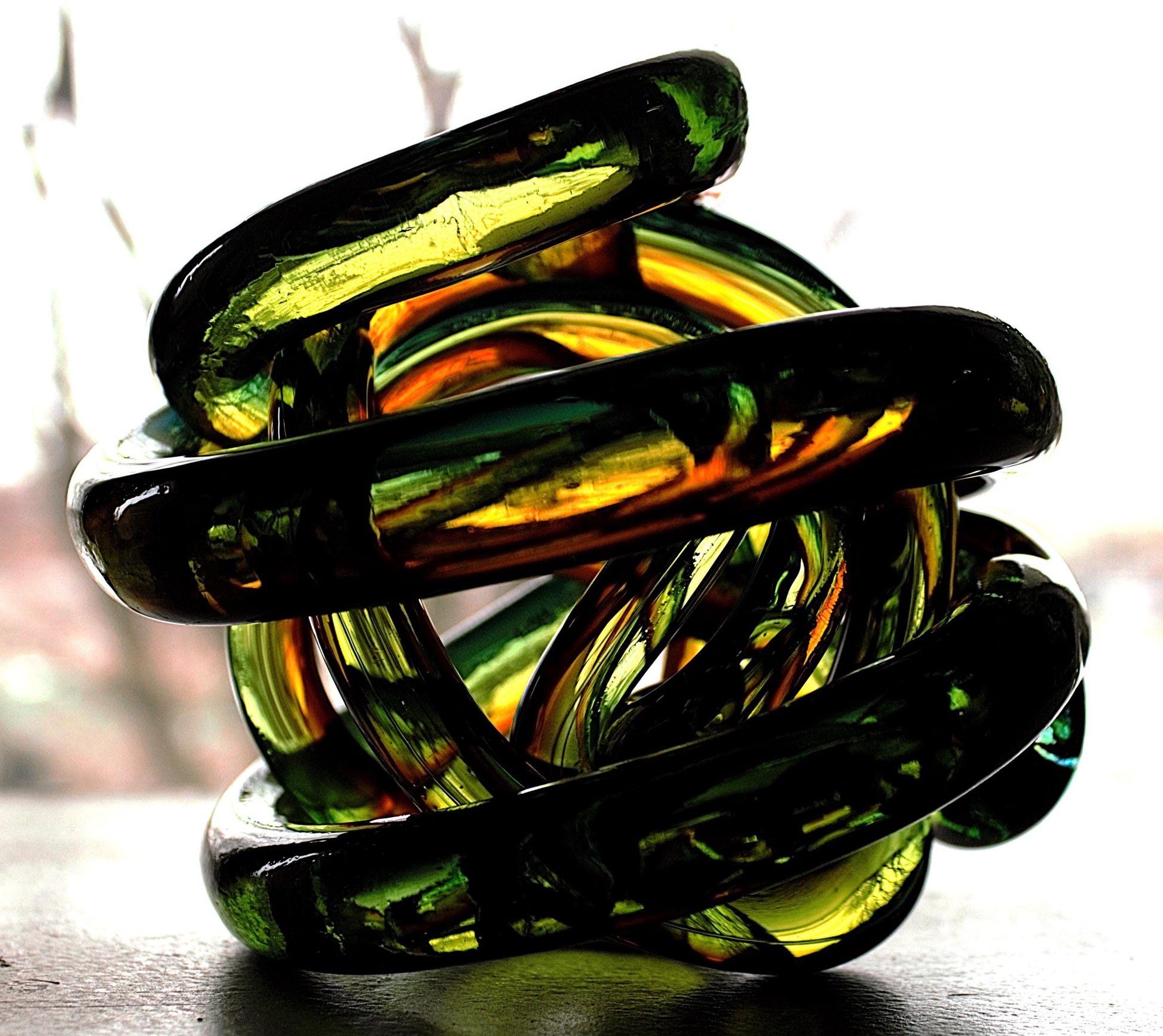 Multicolor Twisted Glass Knot: Intertwining Art Glass Sculpture