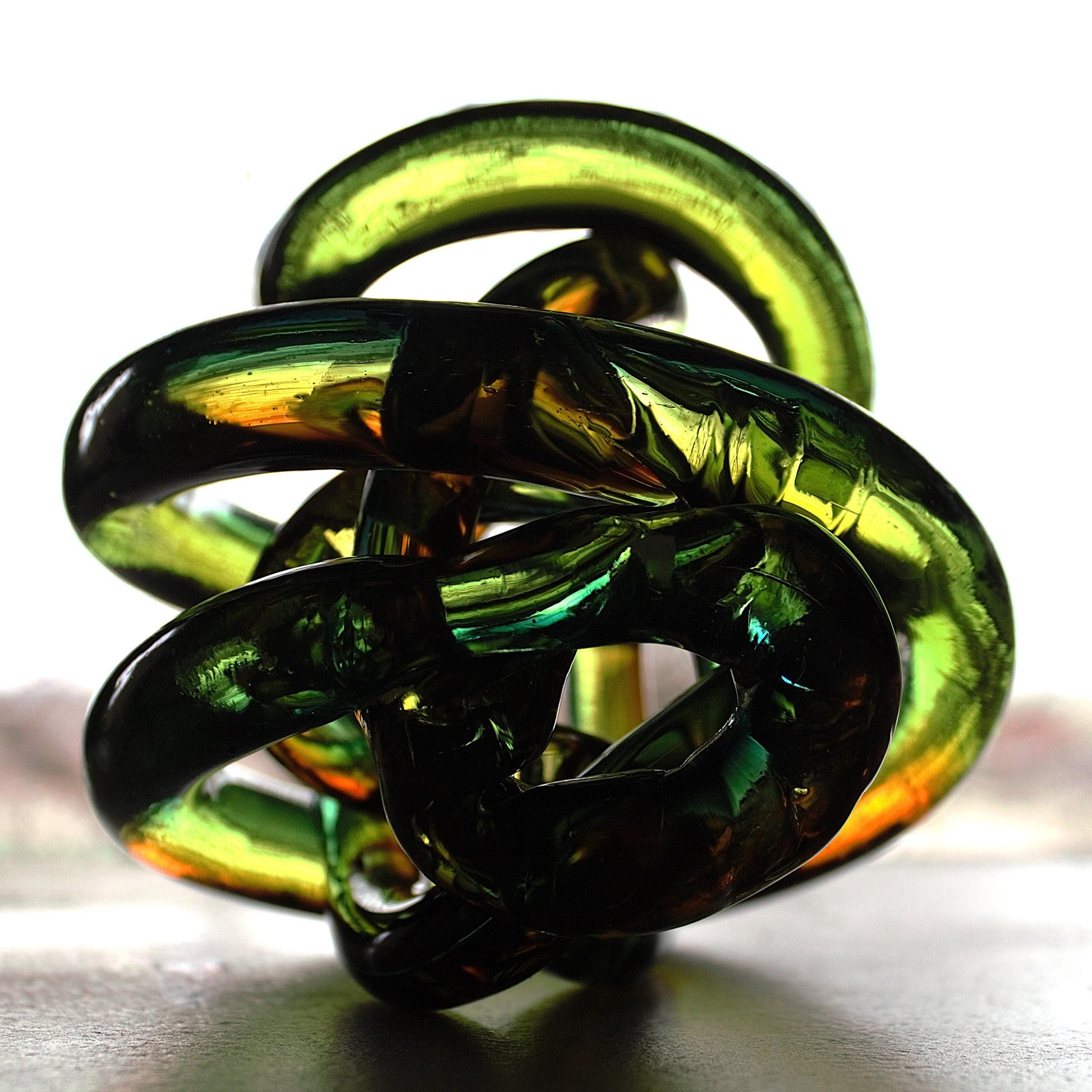 Multicolor Twisted Glass Knot: Intertwining Art Glass Sculpture